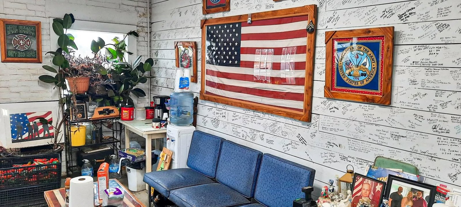 B & G Automotive waiting area with American flag and customer seating